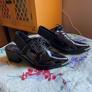 SixtySeven patent leather sling backs